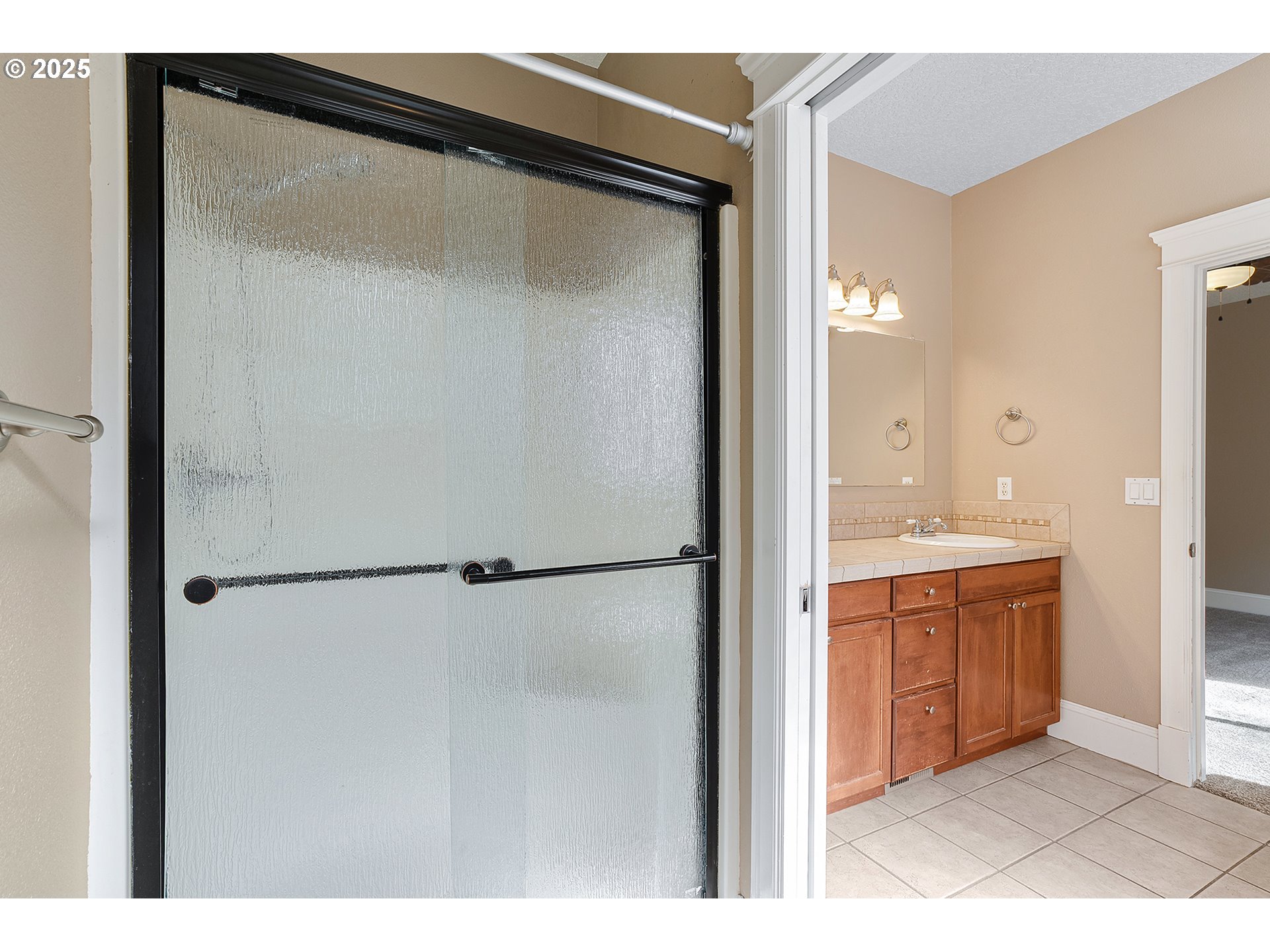 2947 Southeast Maple Place Gresham, OR 97080 - Photo 28 of 46 a bathroom with a shower and a sink