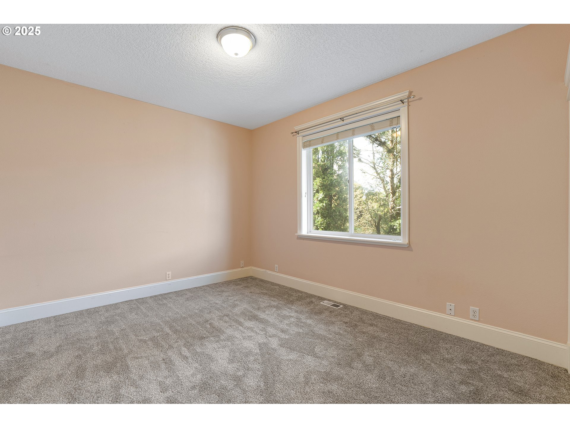 2947 Southeast Maple Place Gresham, OR 97080 - Photo 30 of 46 an empty room with windows