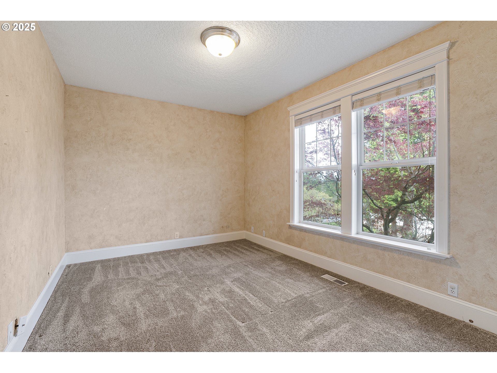 2947 Southeast Maple Place Gresham, OR 97080 - Photo 35 of 46 a view of an empty room with a window