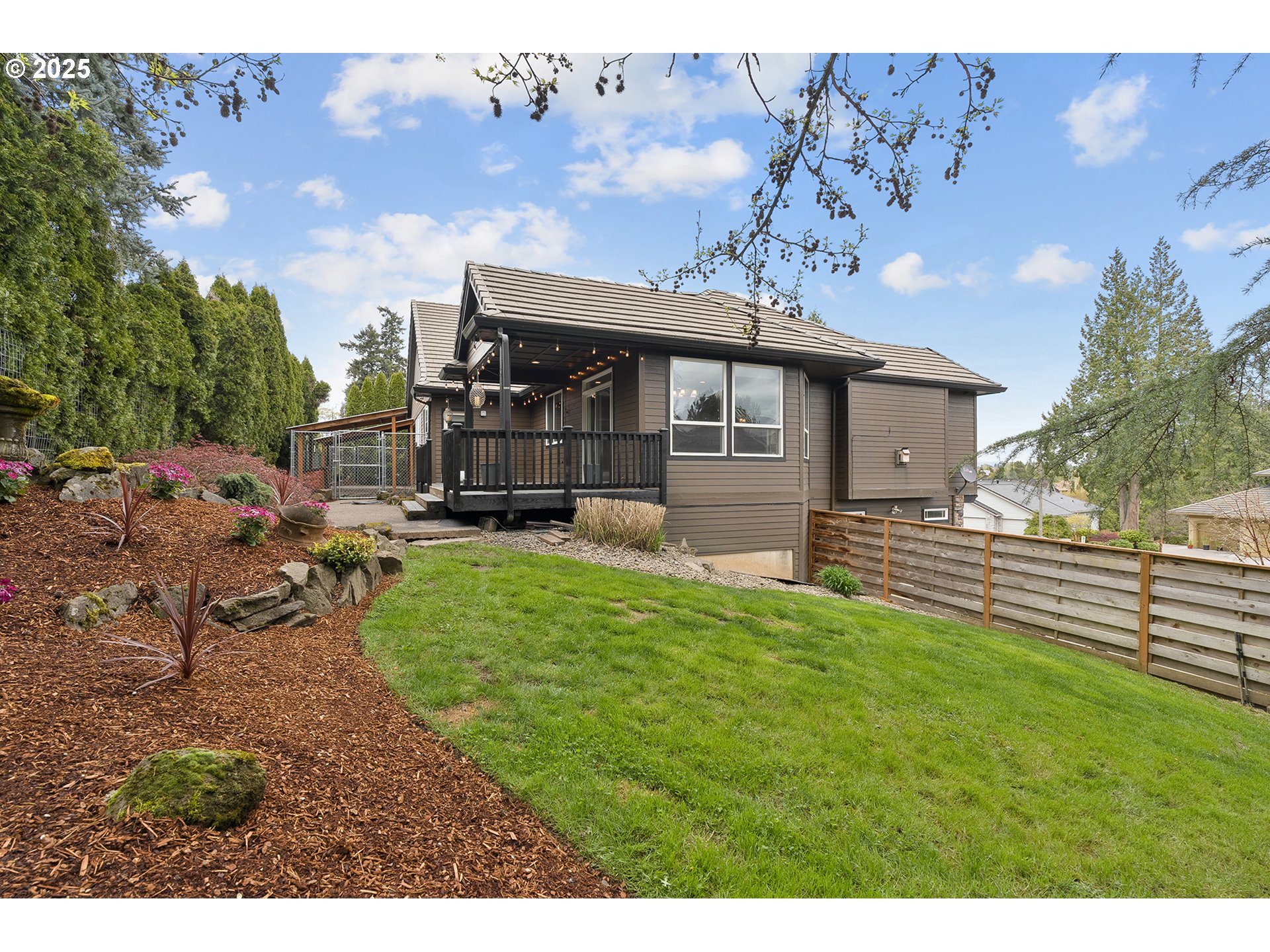 2947 Southeast Maple Place Gresham, OR 97080 - Photo 44 of 46 a view of a house with a backyard