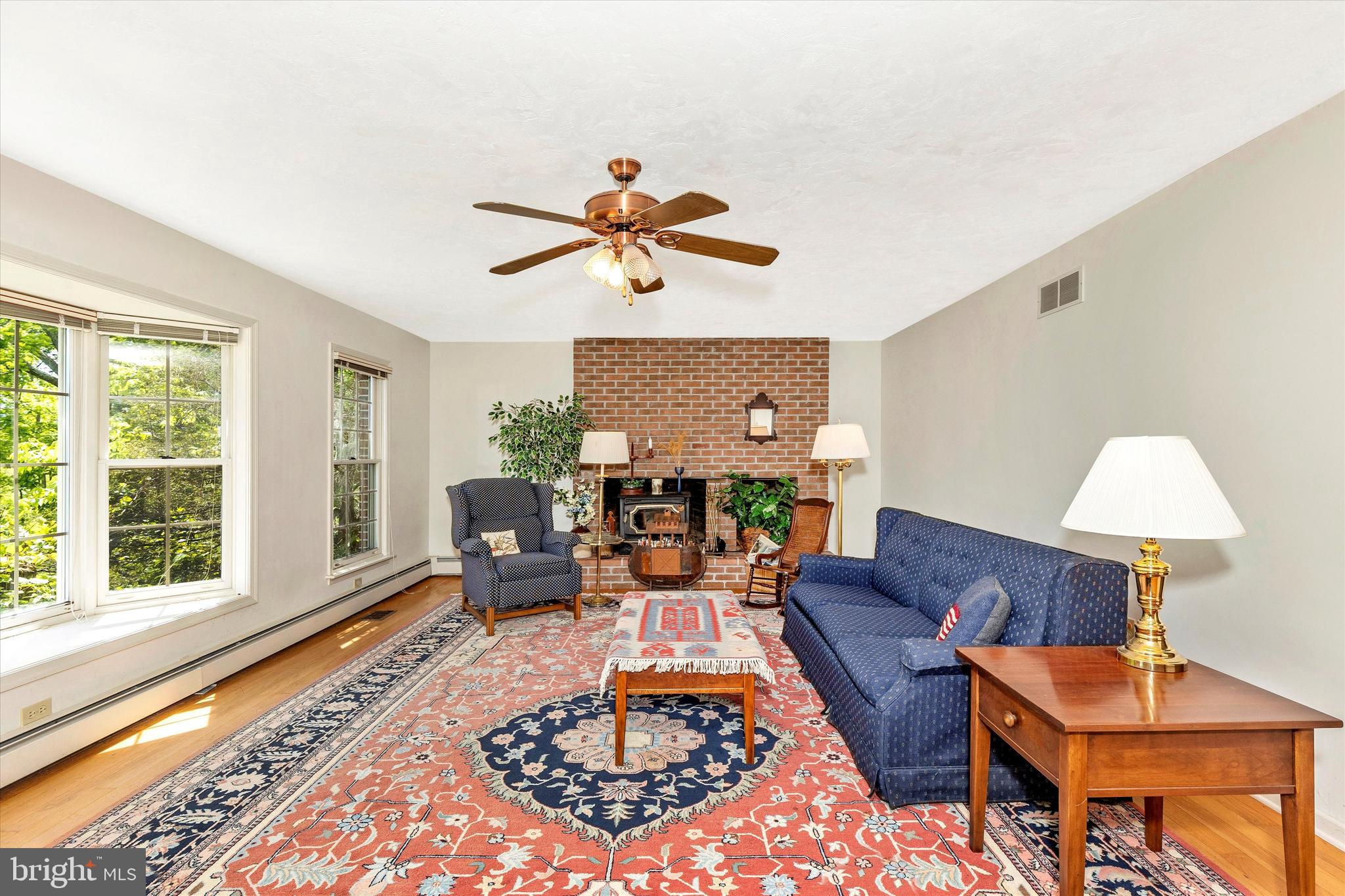 511 Stultz Road Fairfield, PA 17320 - Photo 19 of 86 a living room with furniture a lamp and a window