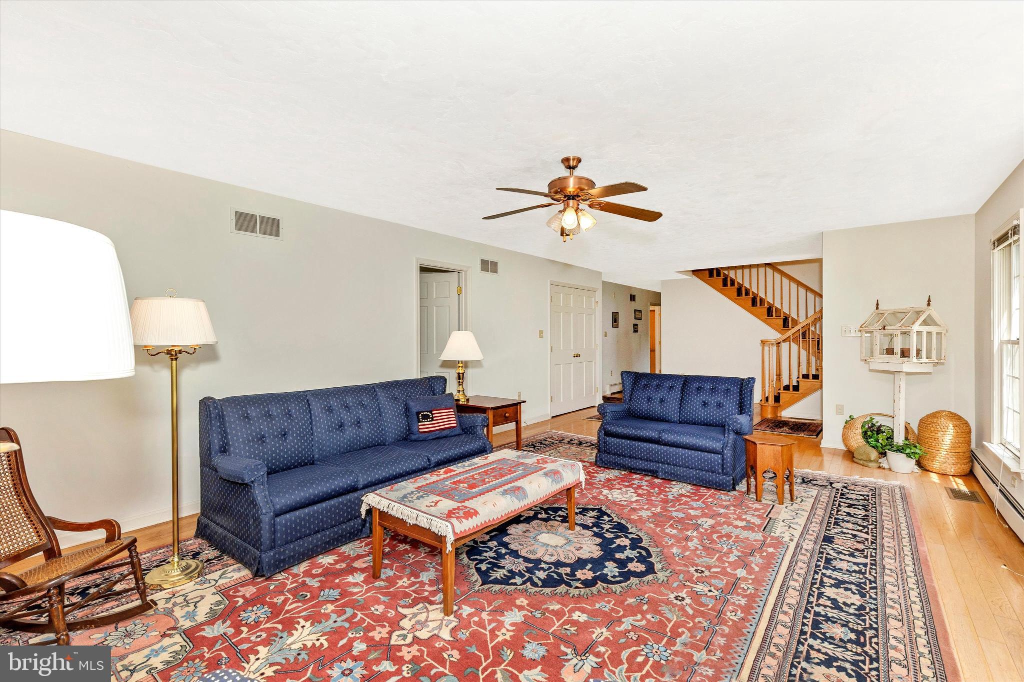 511 Stultz Road Fairfield, PA 17320 - Photo 20 of 86 a living room with furniture a rug and a lamp
