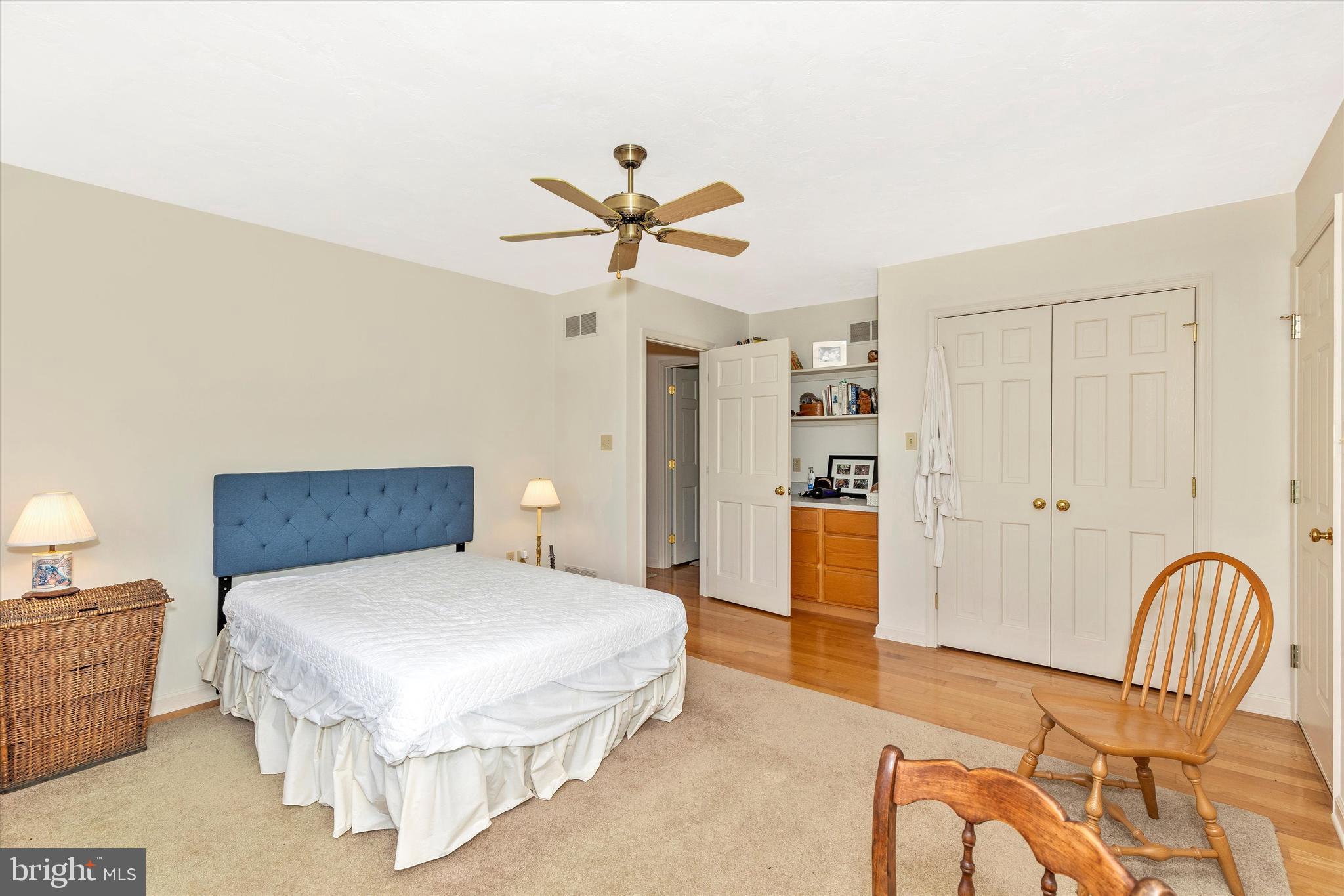 511 Stultz Road Fairfield, PA 17320 - Photo 40 of 86 a bedroom with a bed and a chandelier