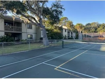 an empty room with closet area