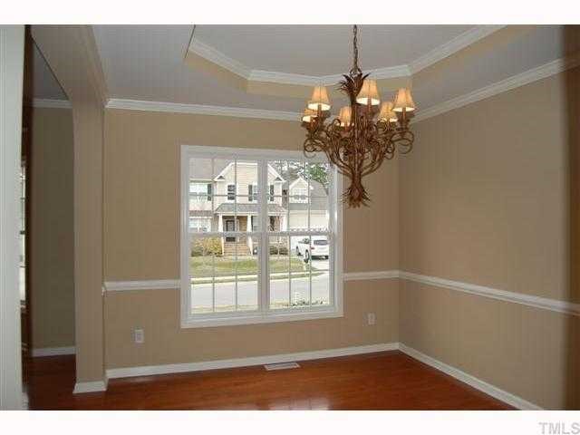 8620 Churchdown Court Raleigh, NC 27613 - Photo 5 of 12 a window in a room