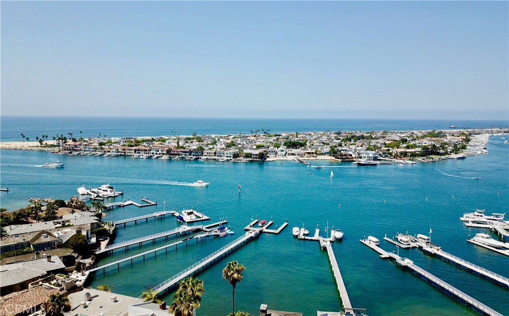 2741 Bungalow Place Corona del Mar, CA 92625 - Photo 23 of 29 an aerial view of a houses with a lake view