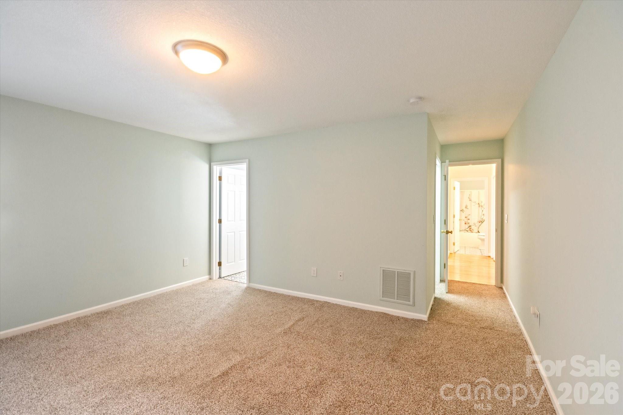 207 Allen Paul Road Hendersonville, NC 28791 - Photo 15 of 28 a view of an empty room and window