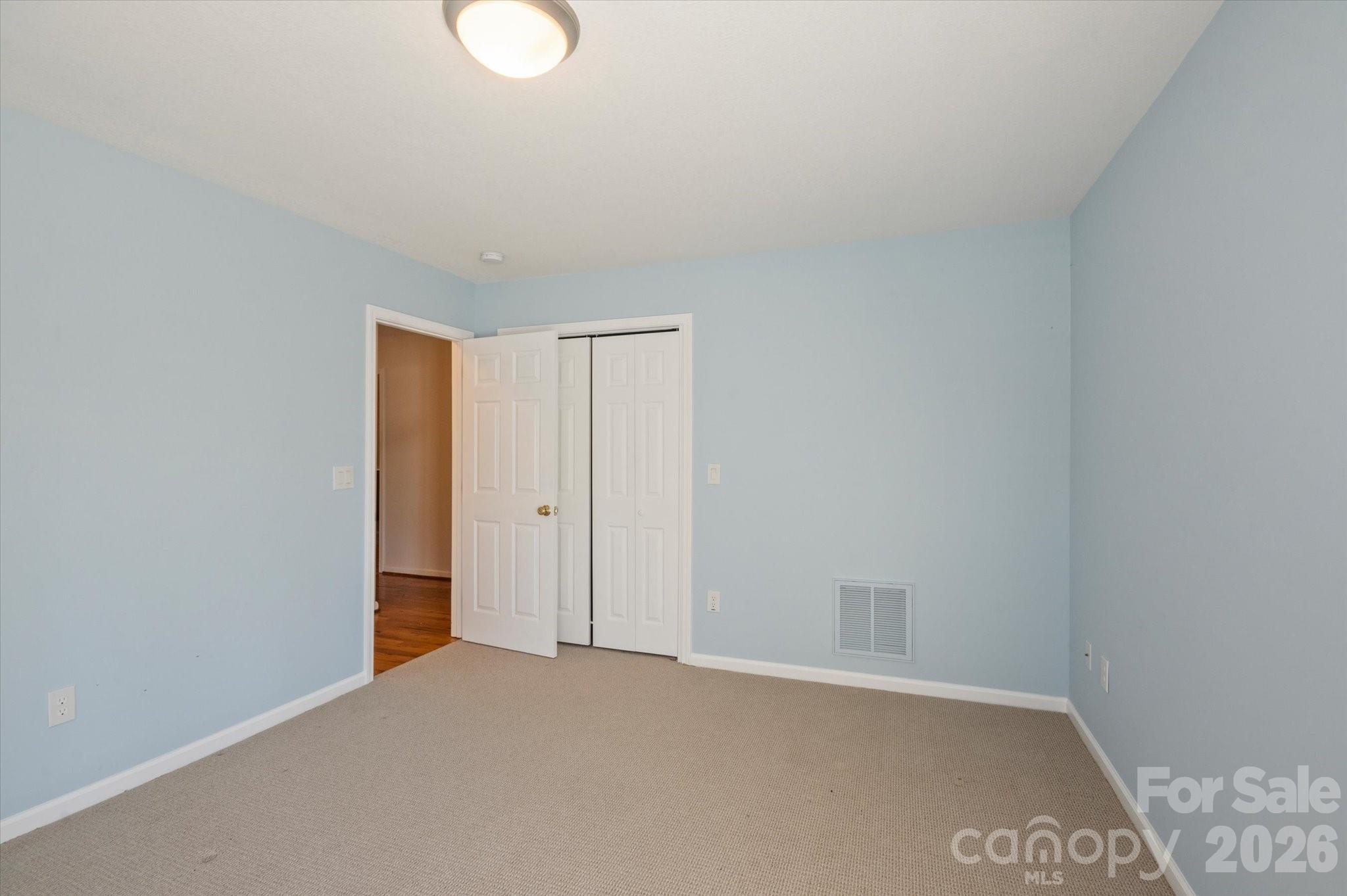 207 Allen Paul Road Hendersonville, NC 28791 - Photo 21 of 28 a view of an empty room
