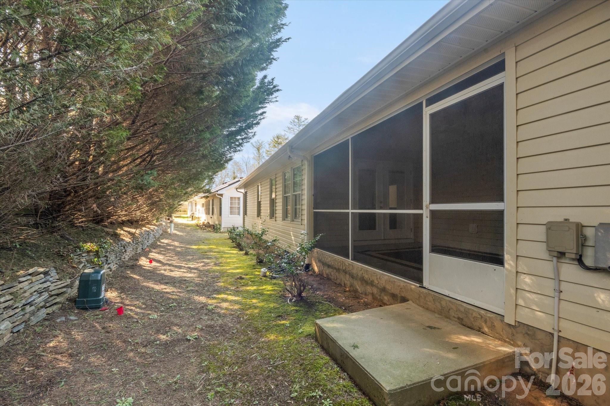 207 Allen Paul Road Hendersonville, NC 28791 - Photo 26 of 28 a view of a house with backyard