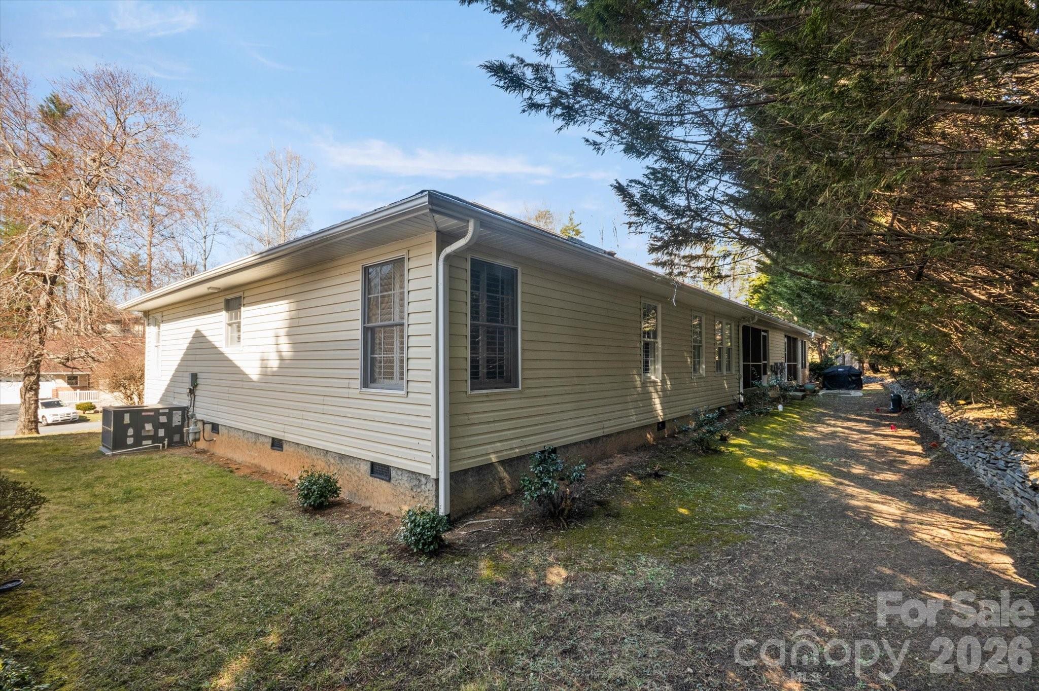 207 Allen Paul Road Hendersonville, NC 28791 - Photo 27 of 28 a view of a house with a yard