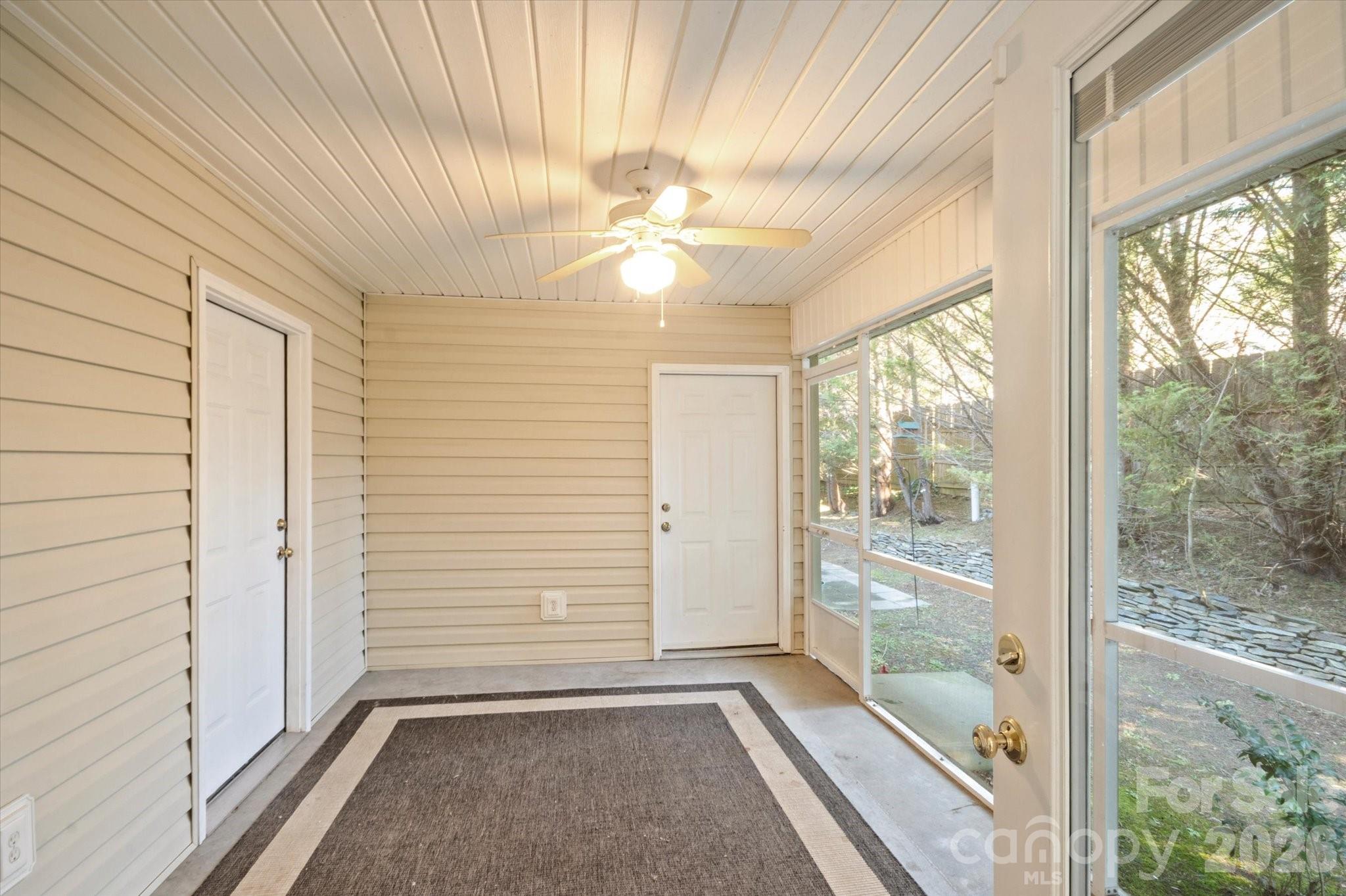 207 Allen Paul Road Hendersonville, NC 28791 - Photo 5 of 28 a view of a hallway with a window