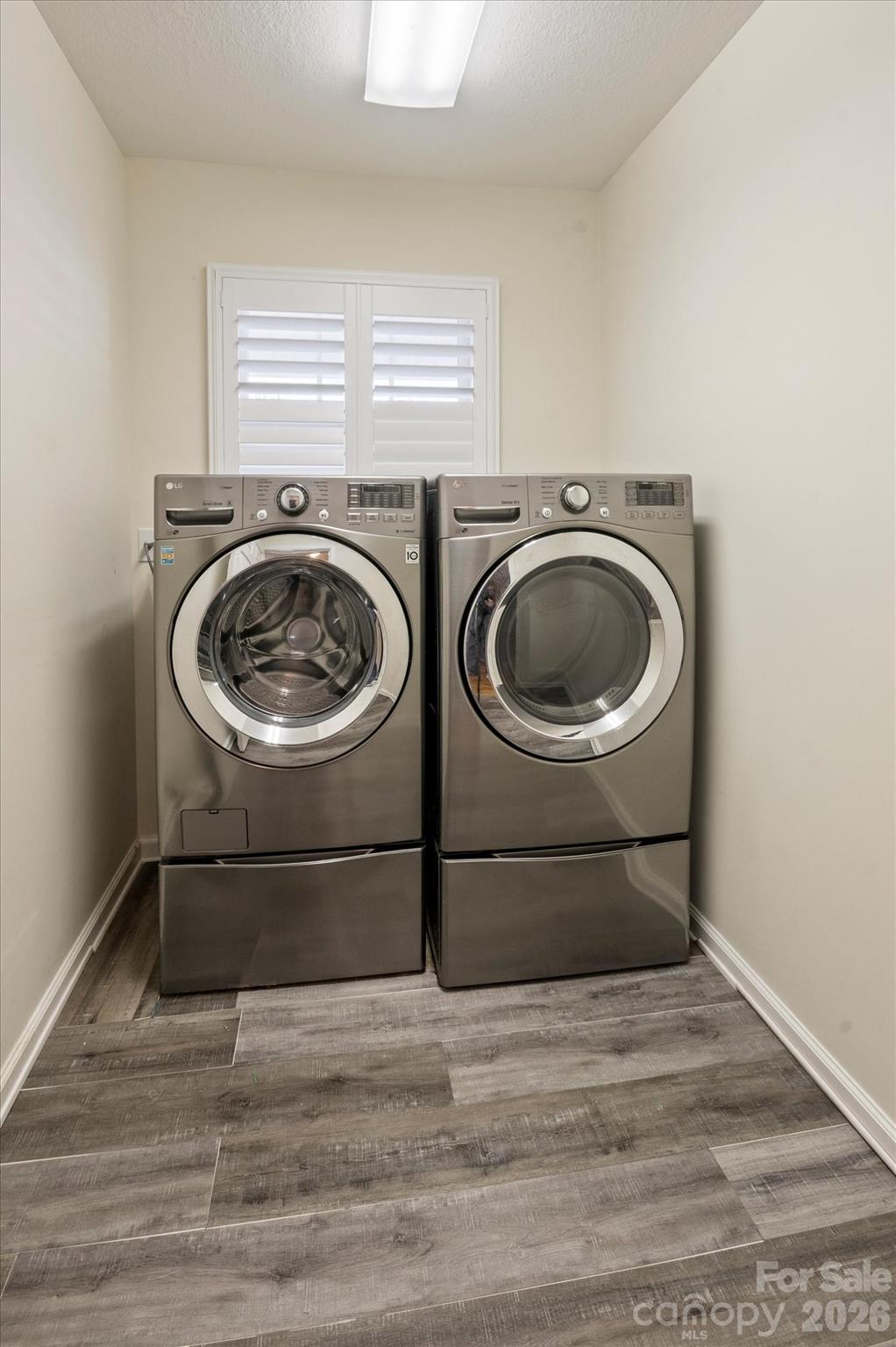 207 Allen Paul Road Hendersonville, NC 28791 - Photo 8 of 28 a utility room with dryer and washer