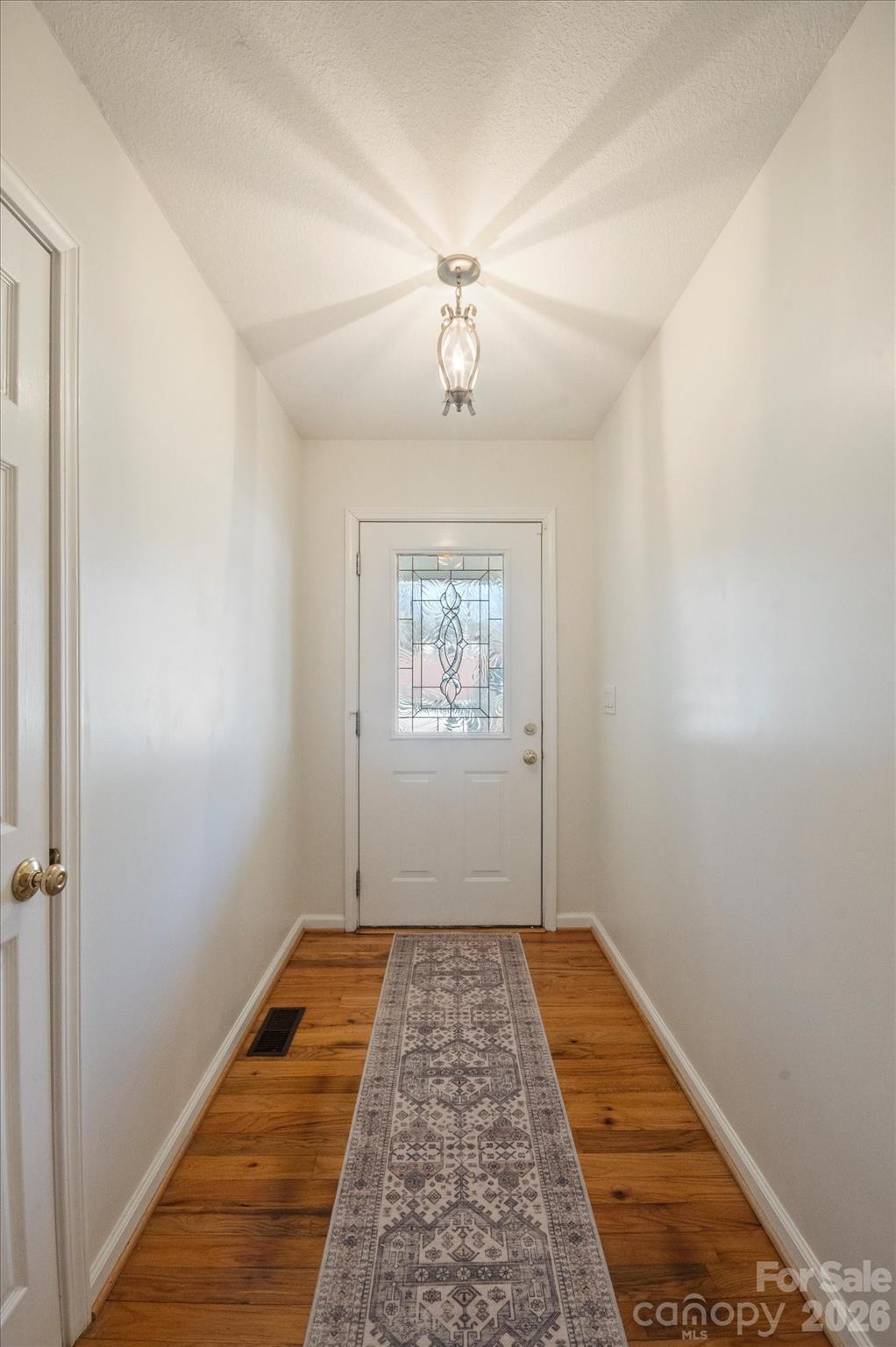 207 Allen Paul Road Hendersonville, NC 28791 - Photo 9 of 28 a view of hallway with a window