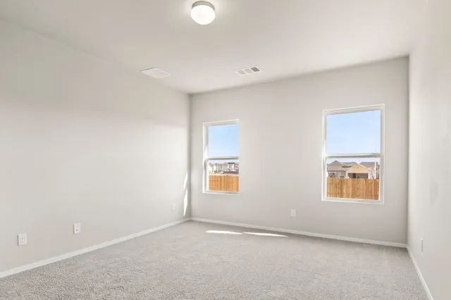 a bathroom with a shower and a sink