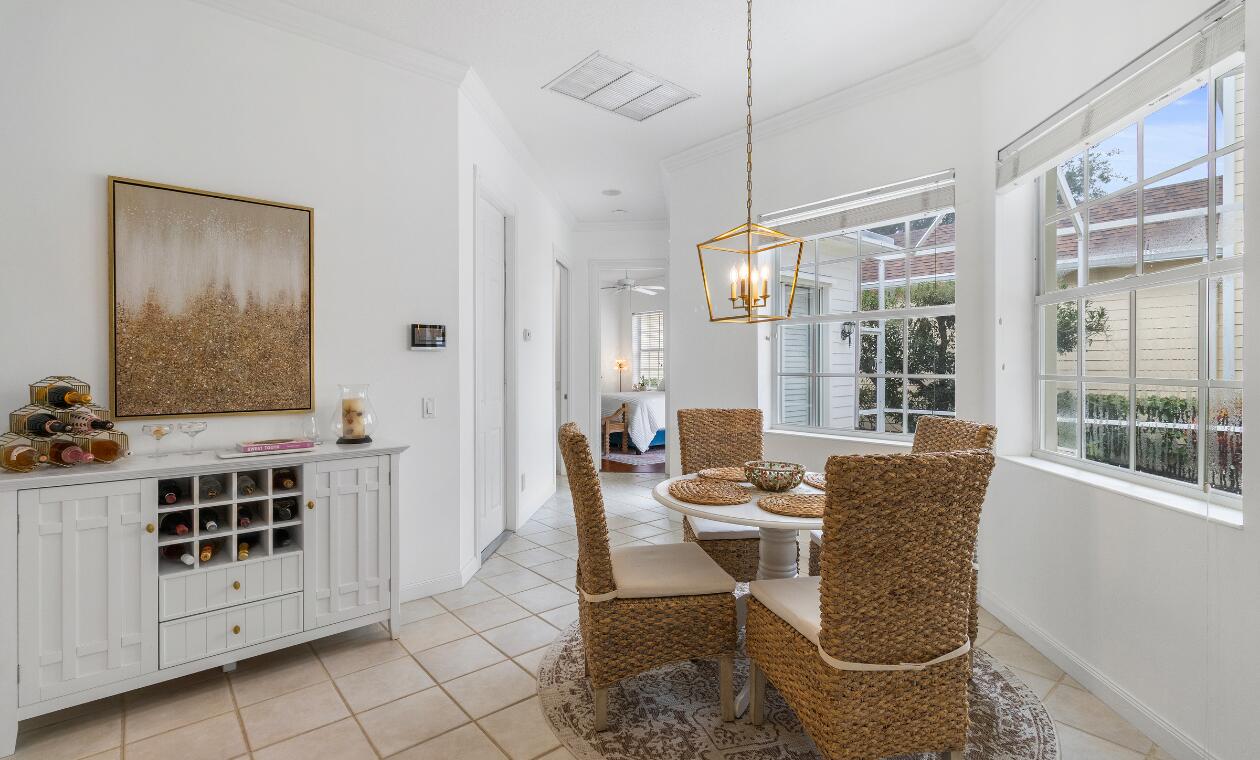 172 Queensland Lane Jupiter, FL 33458 - Photo 14 of 25 a dining room with furniture and window
