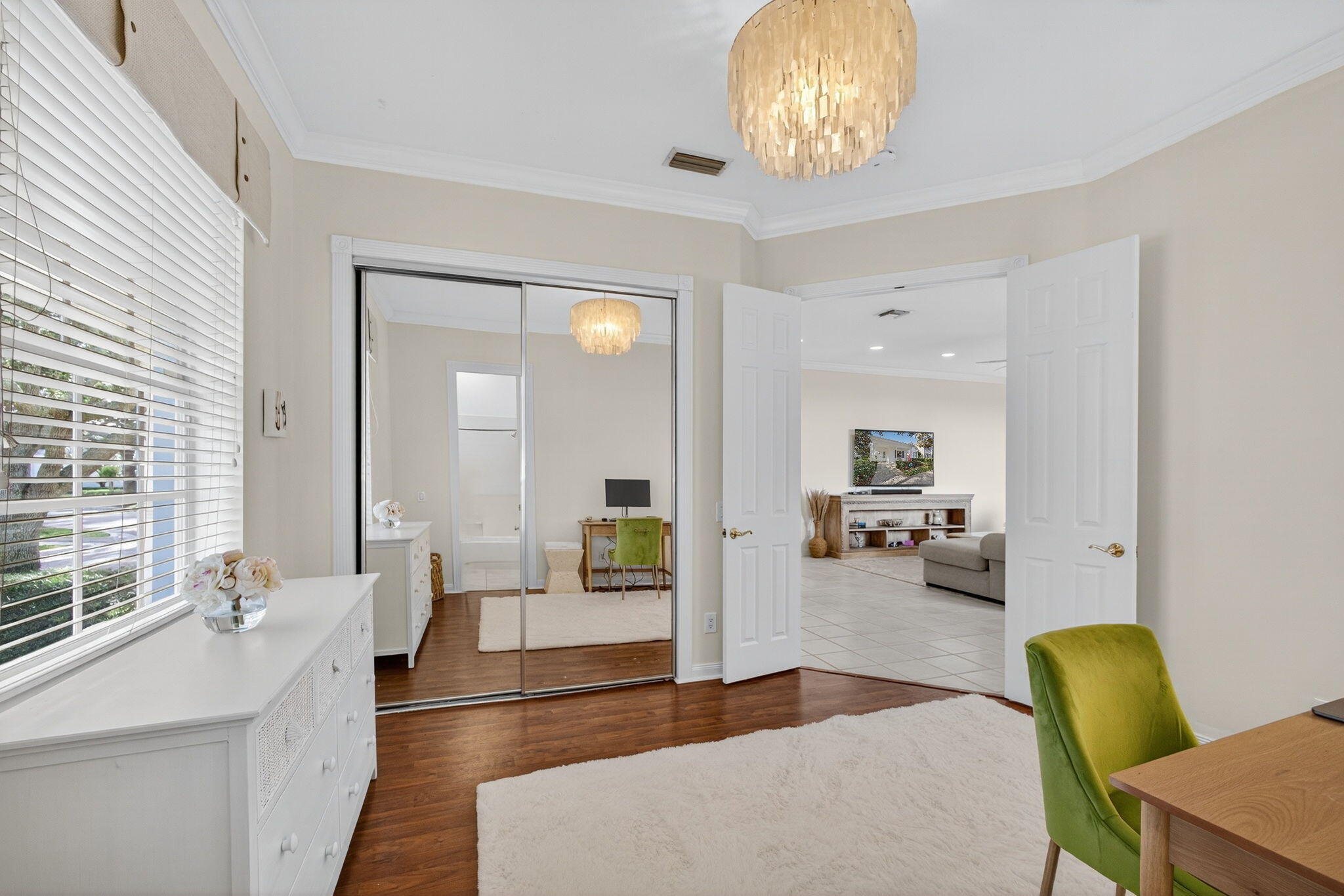 172 Queensland Lane Jupiter, FL 33458 - Photo 17 of 25 a living room with furniture and a large window