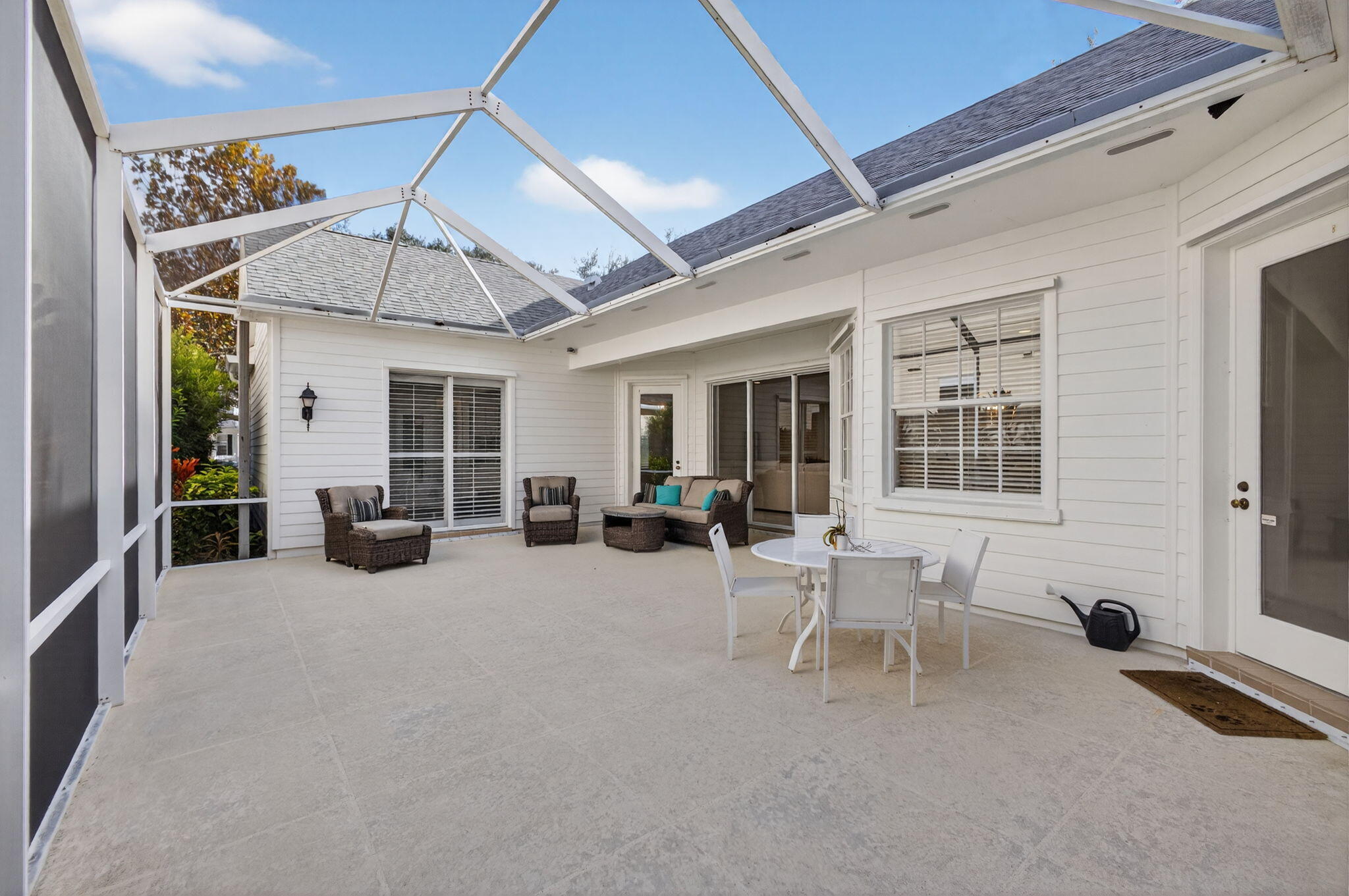 172 Queensland Lane Jupiter, FL 33458 - Photo 19 of 25 a view of a livingroom with furniture and a ceiling fan
