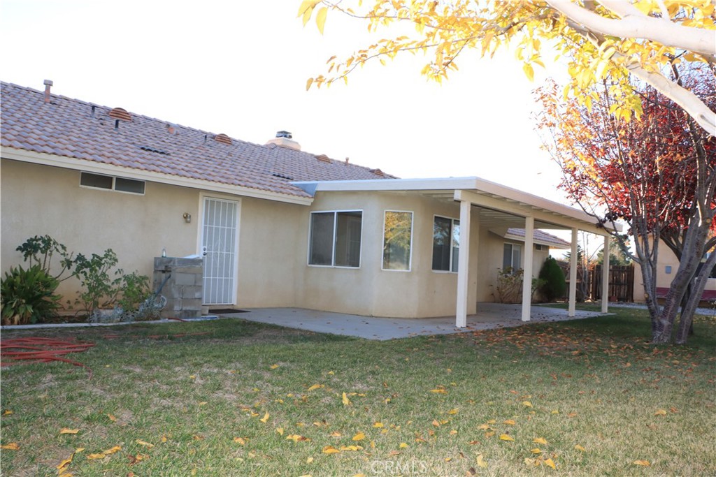 15742 Muscatel Street Hesperia, CA 92345 - Photo 15 of 24 a house view with a garden space