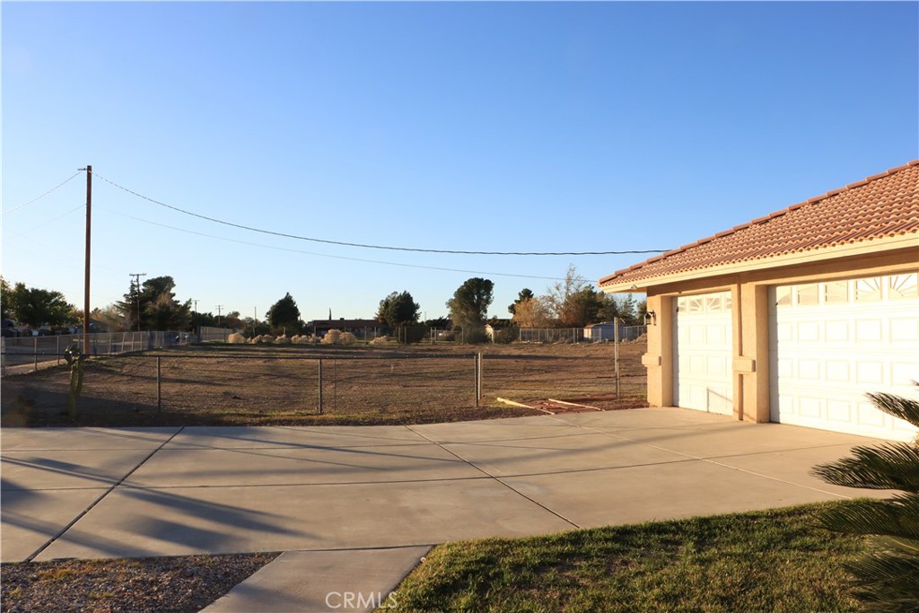 15742 Muscatel Street Hesperia, CA 92345 - Photo 22 of 24 a view of house with outdoor space