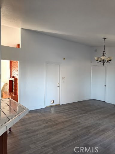 15742 Muscatel Street Hesperia, CA 92345 - Photo 3 of 24 a view of a room with wooden floor
