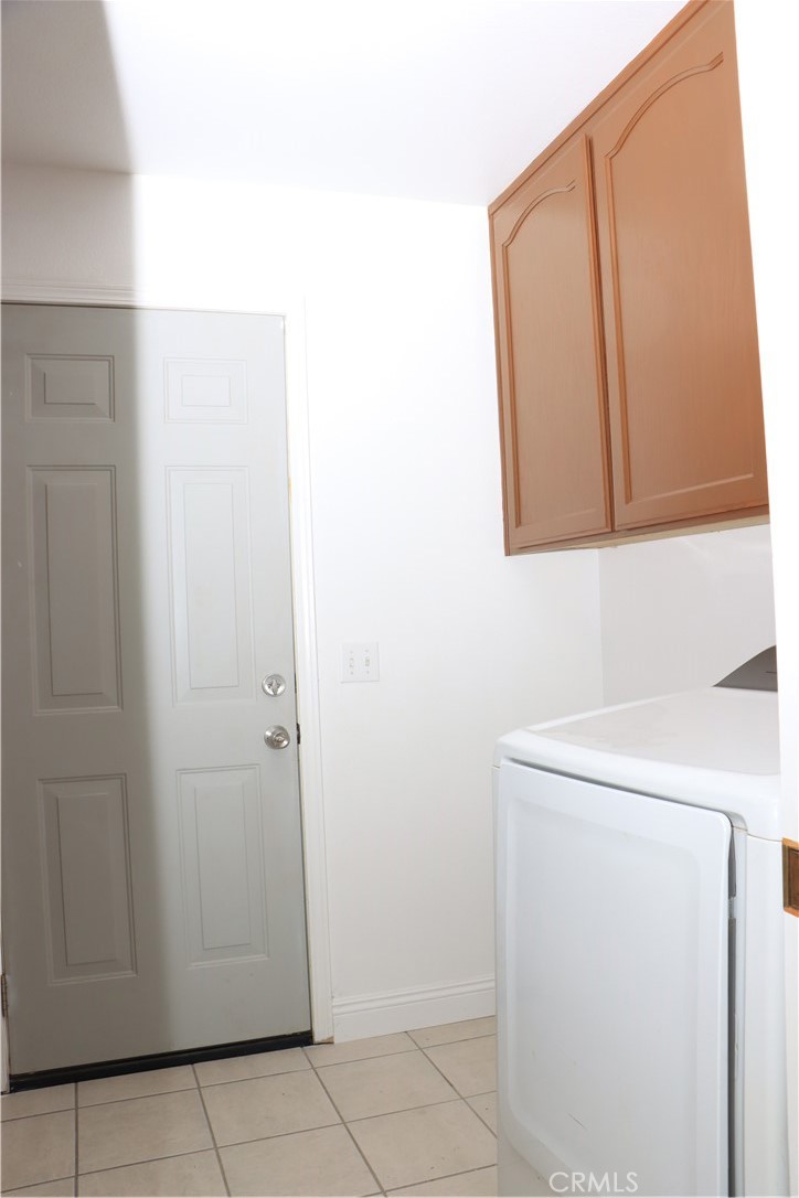 15742 Muscatel Street Hesperia, CA 92345 - Photo 8 of 24 a bathroom with a sink a vanity and a window