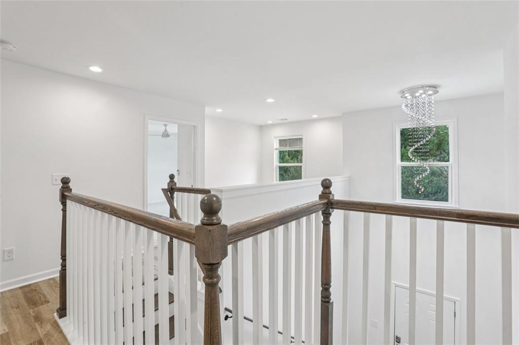 4405 Belcamp Road Fairburn, GA 30213 - Photo 23 of 60 a view of a hallway with windows