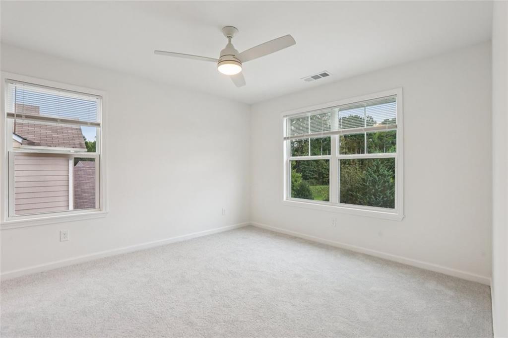 4405 Belcamp Road Fairburn, GA 30213 - Photo 24 of 60 an empty room with a window