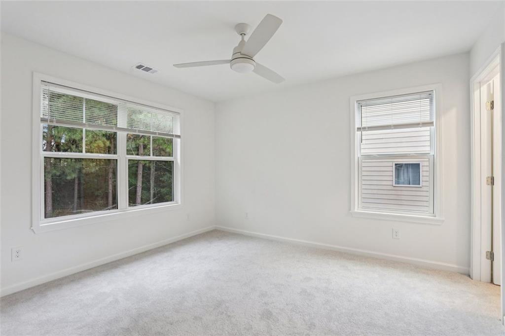 4405 Belcamp Road Fairburn, GA 30213 - Photo 29 of 60 a view of an empty room with a window