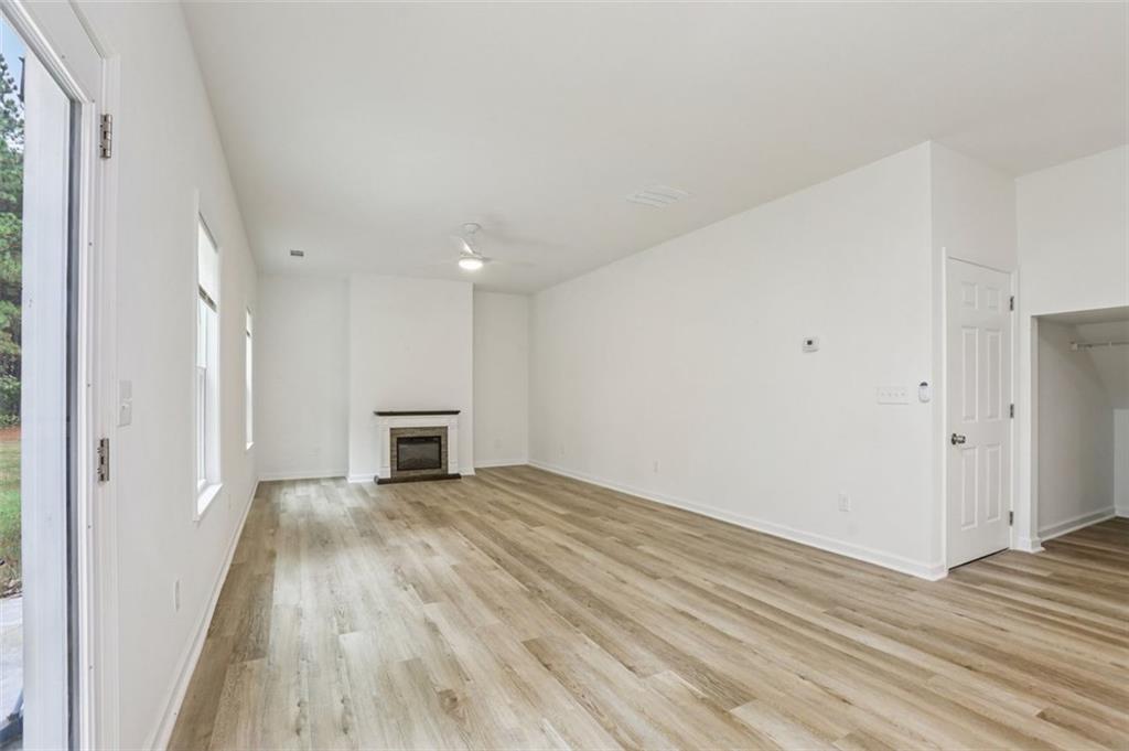 4405 Belcamp Road Fairburn, GA 30213 - Photo 5 of 60 a view of a livingroom with wooden floor