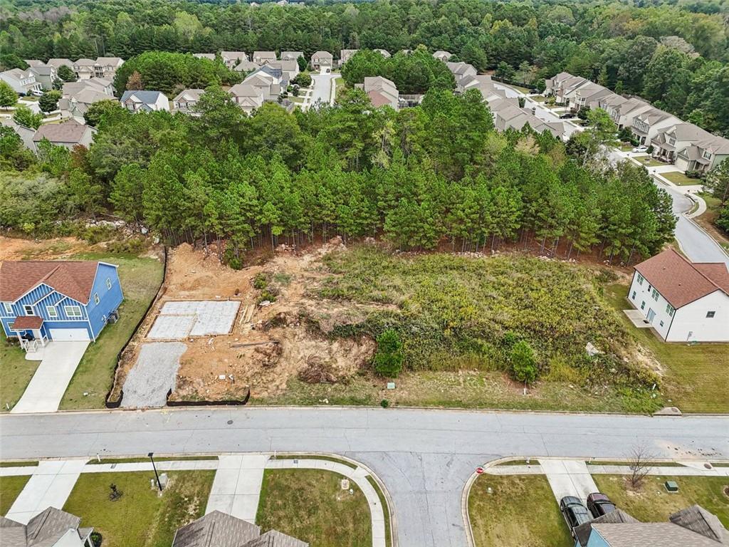 4405 Belcamp Road Fairburn, GA 30213 - Photo 52 of 60 an aerial view of a house with a yard