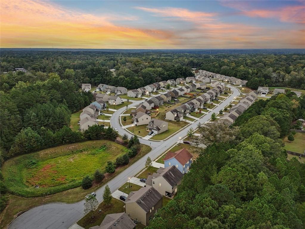 4405 Belcamp Road Fairburn, GA 30213 - Photo 56 of 60 an aerial view of a house with a outdoor space