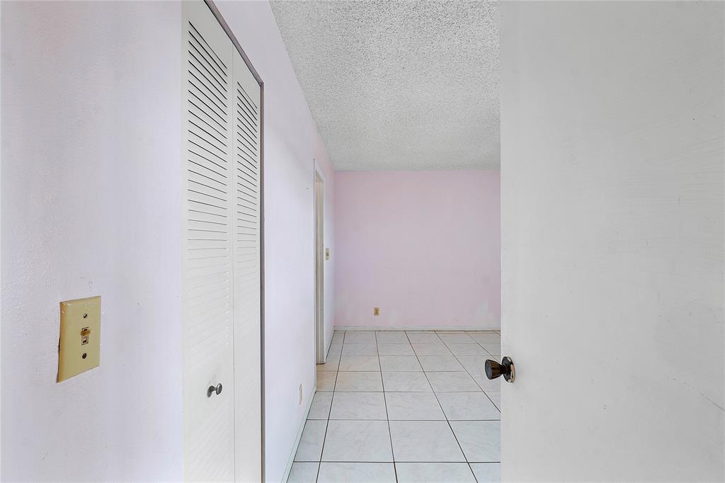 8205 Northwest 61st Street, Unit B305 Tamarac, FL 33321 - Photo 23 of 50 a view of an empty room