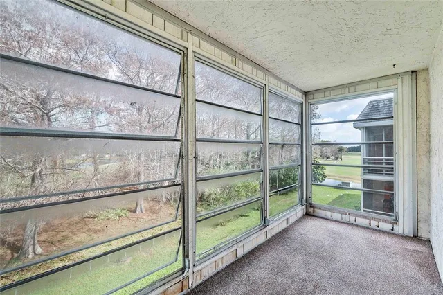 a view of a sign on the side of the house