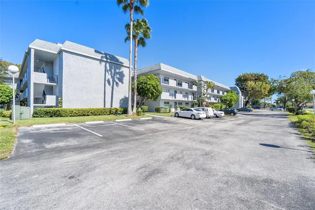 a view of yard with swimming pool and outdoor seating