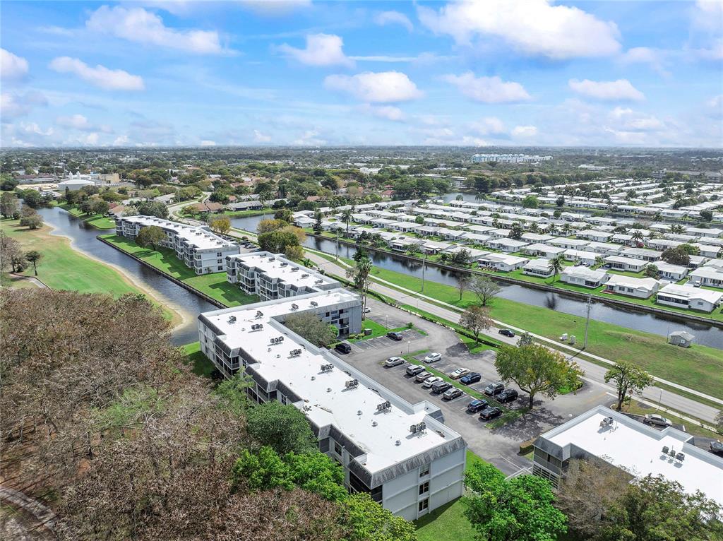 8205 Northwest 61st Street, Unit B305 Tamarac, FL 33321 - Photo 39 of 50 an aerial view of a city with lots of buildings