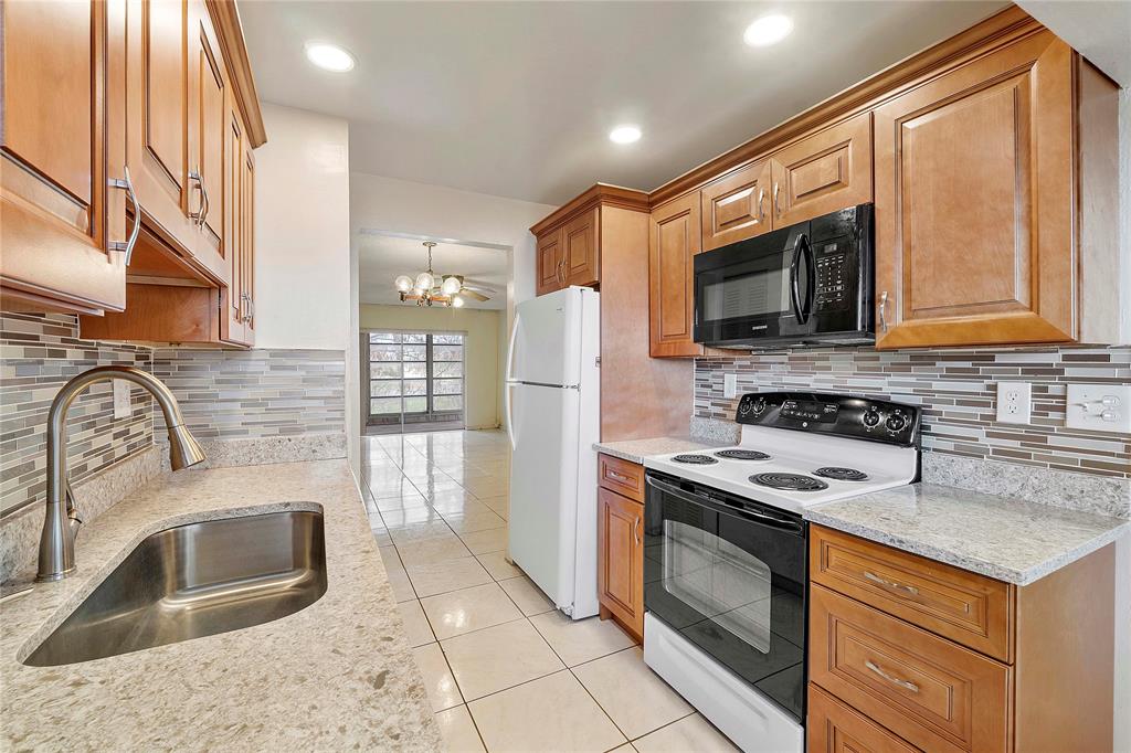 8205 Northwest 61st Street, Unit B305 Tamarac, FL 33321 - Photo 6 of 50