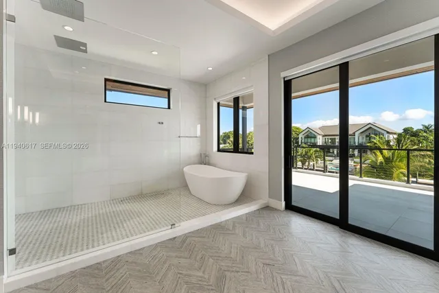 a bathroom with a sink vanity and mirror