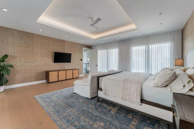 a bathroom with a tub and a shower