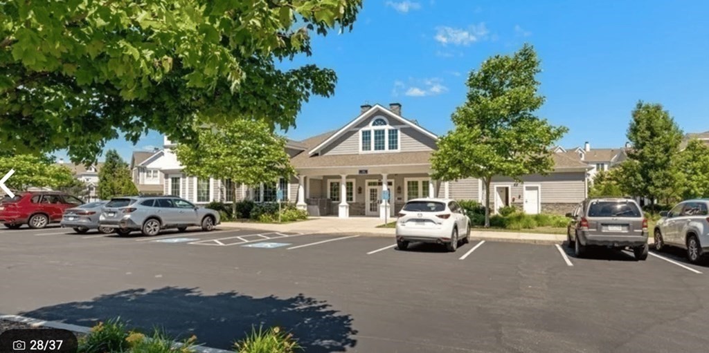 113 Halsted, Unit 113 Hingham, MA 02043 - Photo 29 of 41 a car parked in front of a house