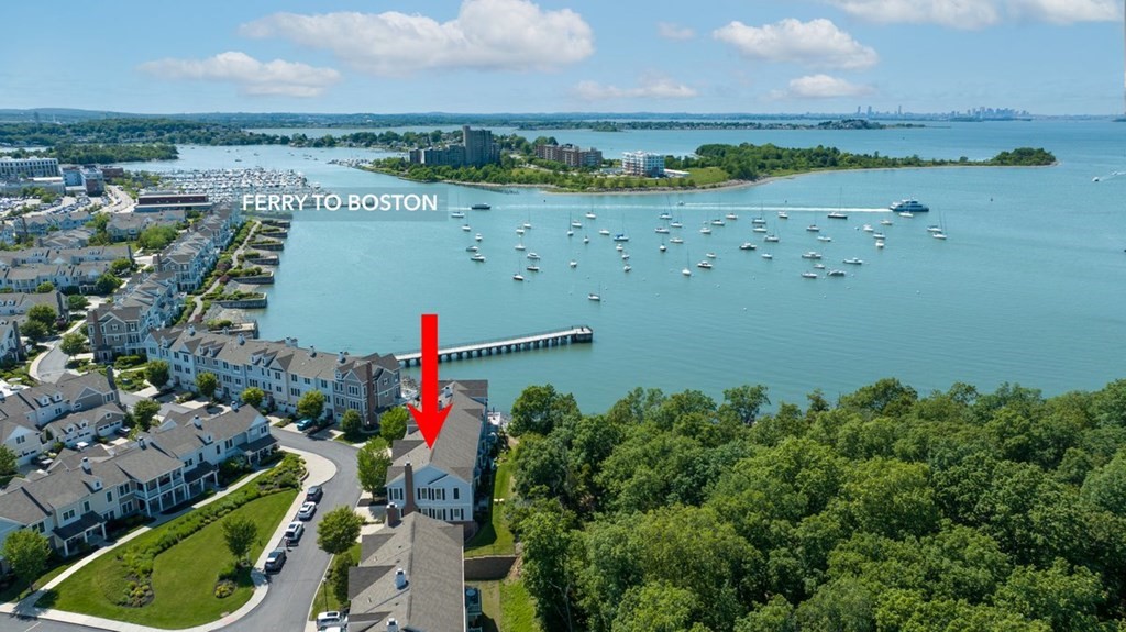 113 Halsted, Unit 113 Hingham, MA 02043 - Photo 36 of 41 an aerial view of a houses with a yard