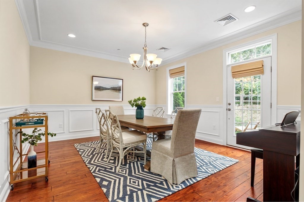 113 Halsted, Unit 113 Hingham, MA 02043 - Photo 6 of 41 a view of a dining room with furniture window and wooden floor