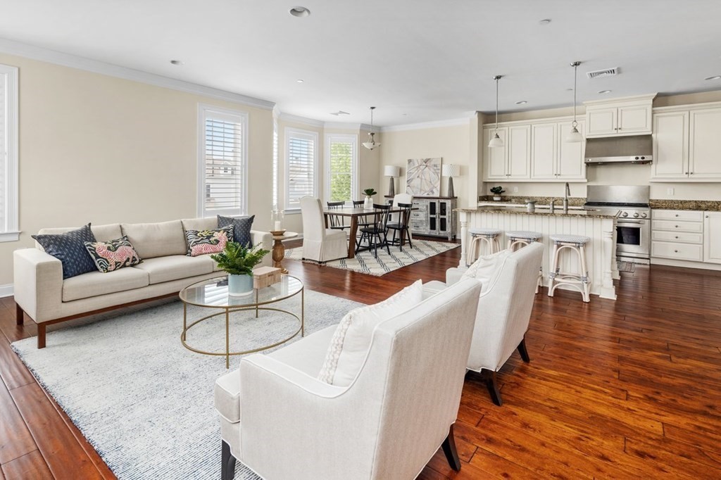 113 Halsted, Unit 113 Hingham, MA 02043 - Photo 7 of 41 a living room with furniture white walls and kitchen view