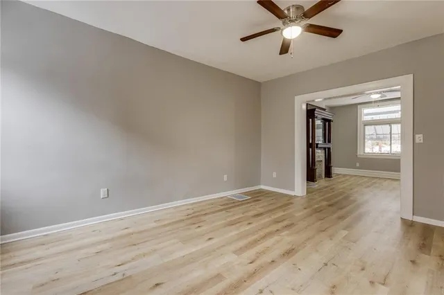 a view of an empty room and window