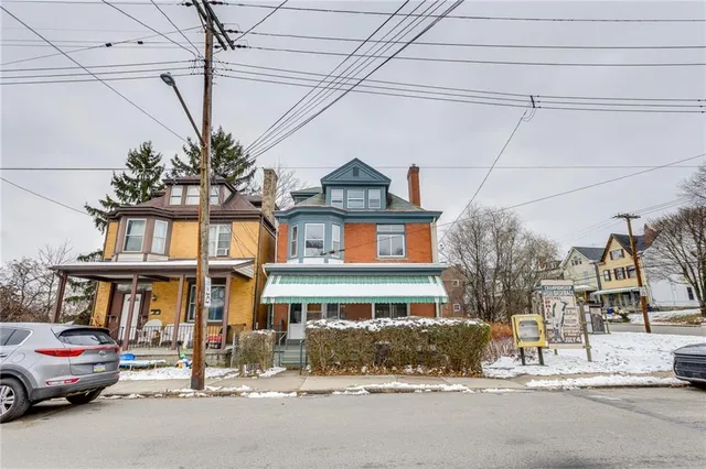a car parked in front of a building