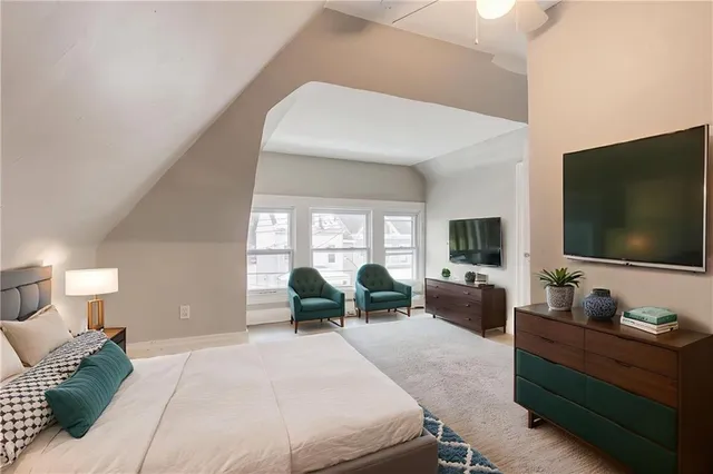 a work room with furniture and book shelf