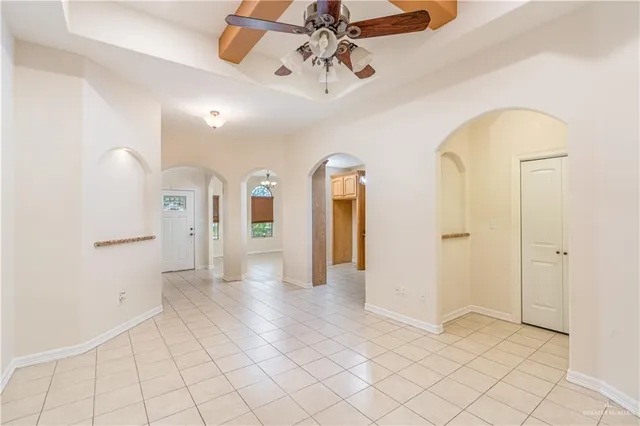 a view of an entryway with a chandelier