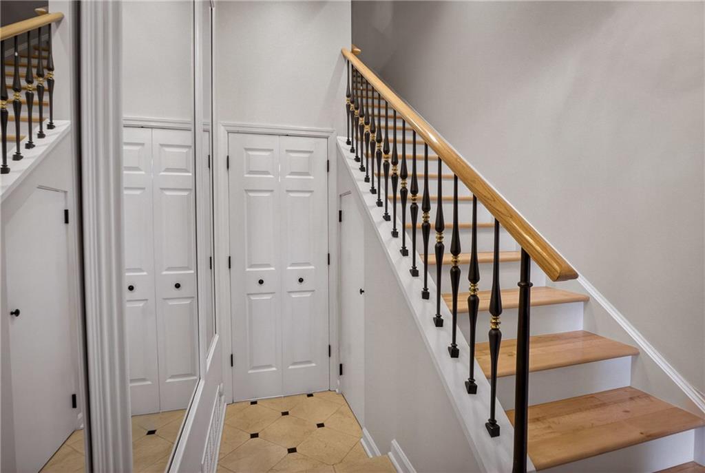 136 North Woodland Road Pittsburgh, PA 15232 - Photo 6 of 43 a view of a hallway with wooden floor and staircase