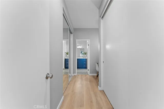 a view of a room that has a table and chairs in it