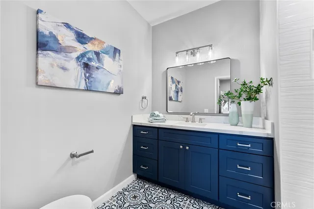 a bathroom with a shower and a sink