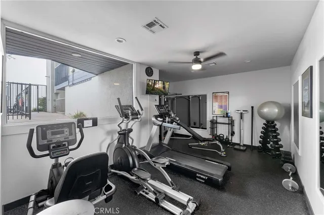 a view of wooden floor and a window